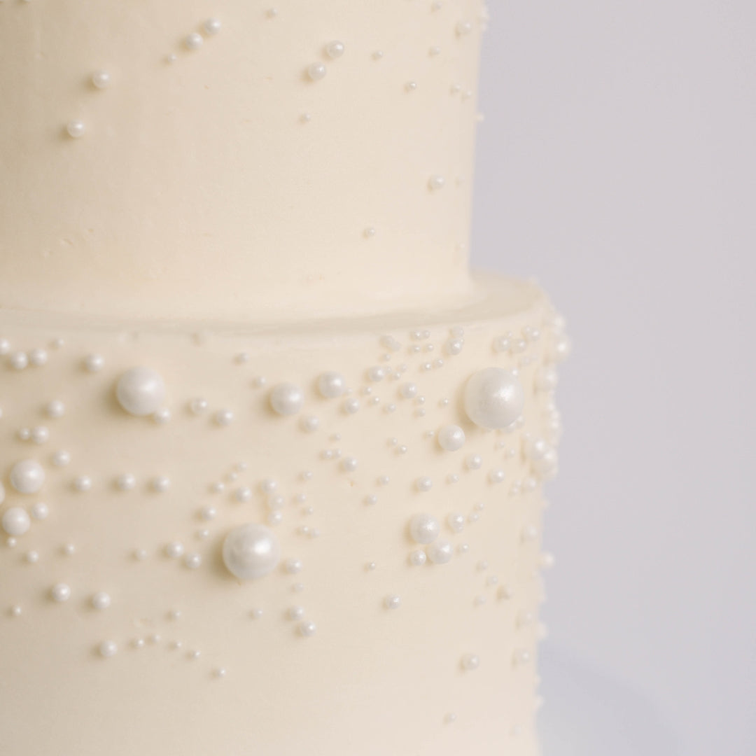 Cascading Pearls • Two Tiered Designer Cake