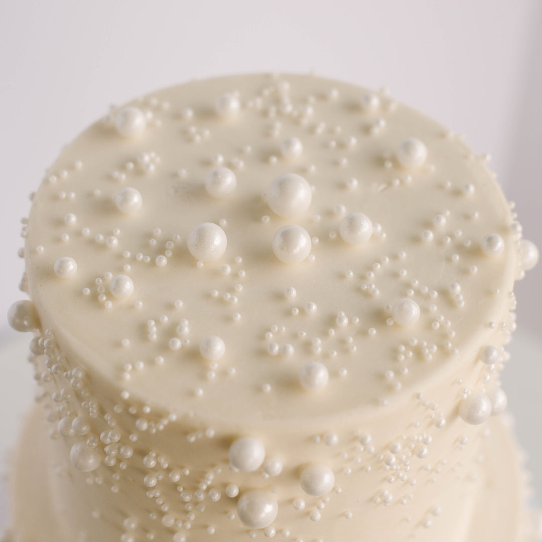 Cascading Pearls • Two Tiered Designer Cake