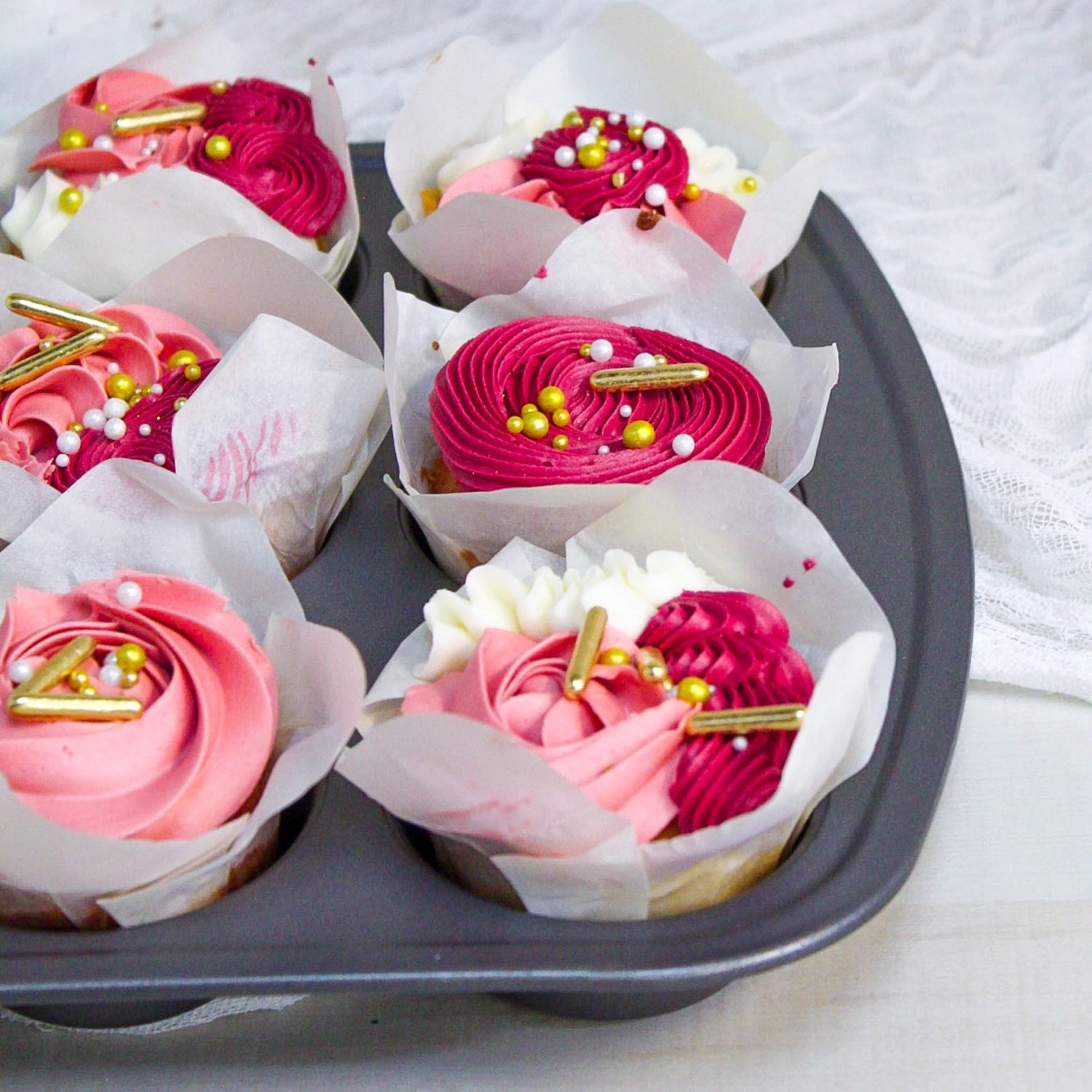 Pretty in Pink • Designer Cupcakes